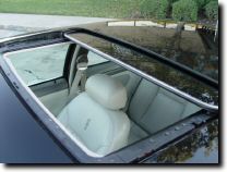 Factory moonroof - Notice the chrome strip on the sliding section